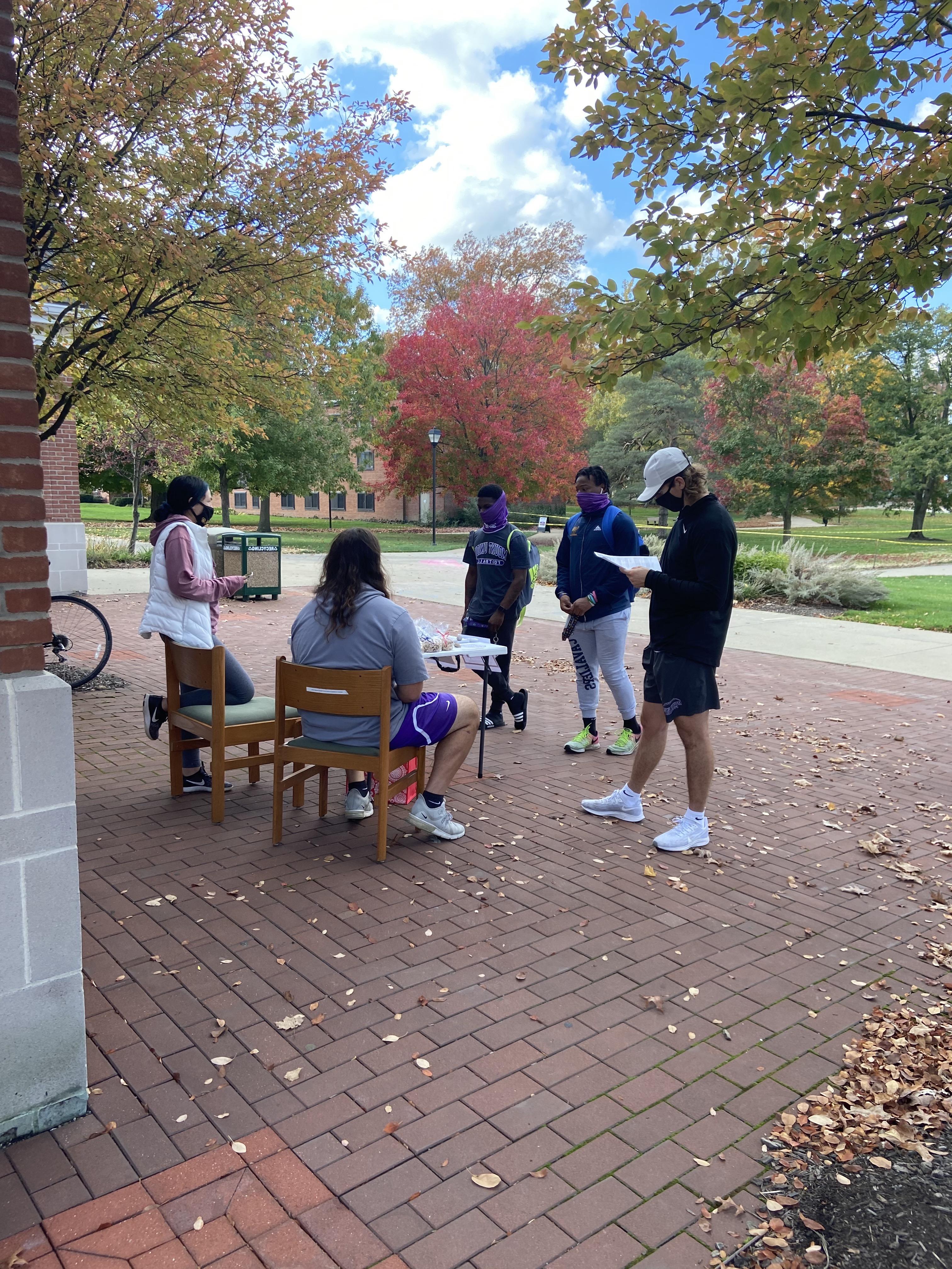 students registering to vote on campus